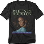 Black t-shirt featuring Whitney Houston portrait with text “Whitney Houston” and “Greatest Love of All.”