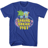 Bright blue T-shirt featuring a retro MTV Spring Break 1987 logo with palm trees and vibrant yellow and pink lettering.