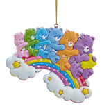 Colorful Care Bears ornament featuring multiple bears hugging on a rainbow with clouds and stars.
