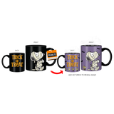 Heat-changing coffee mug featuring Snoopy and Woodstock as mummies for Halloween, also with Trick or Treat text.