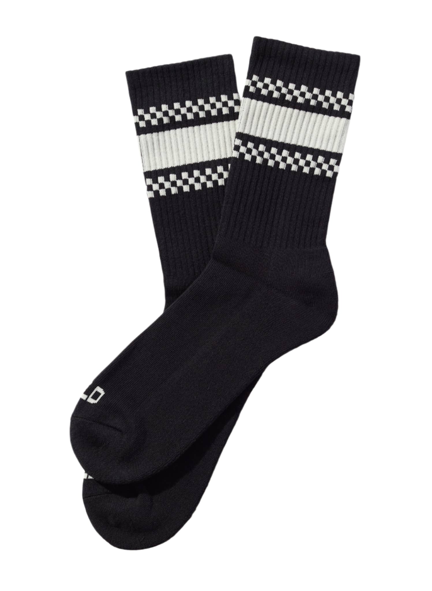 Black socks with white checkered patterns on a beige background