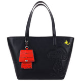 Black faux leather Snoopy tote bag with embossed Peanuts design and detachable red doghouse pouch charm