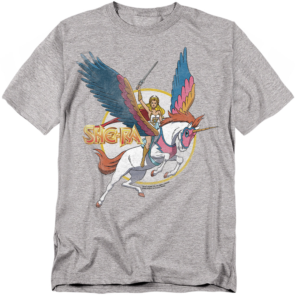 Grey She-Ra t-shirt featuring She-Ra riding Swift Wind, her winged unicorn, with a raised sword and a bold retro She-Ra logo beside them