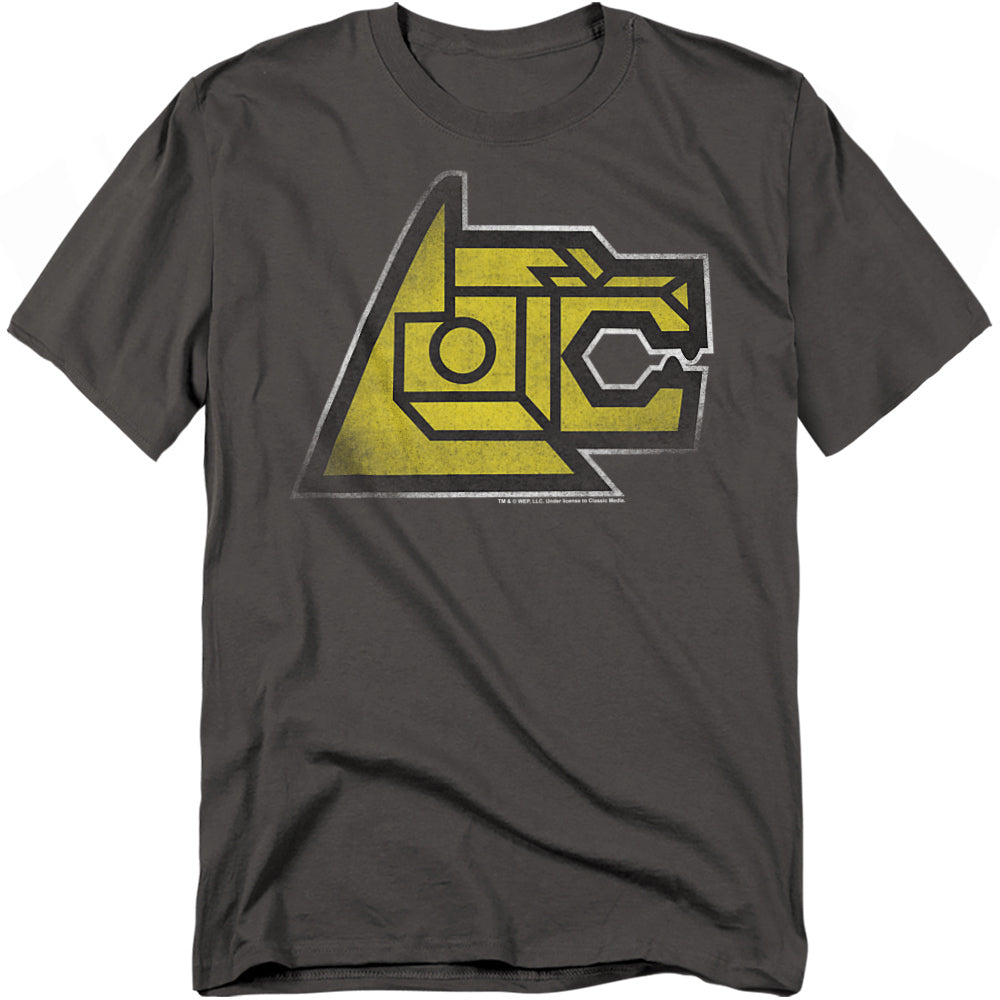 A charcoal gray t-shirt featuring the yellow lion head from Voltron in a bold, angular graphic design. The artwork highlights the mechanical details of the lion’s face, symbolizing its role as one of Voltron’s mighty limbs.