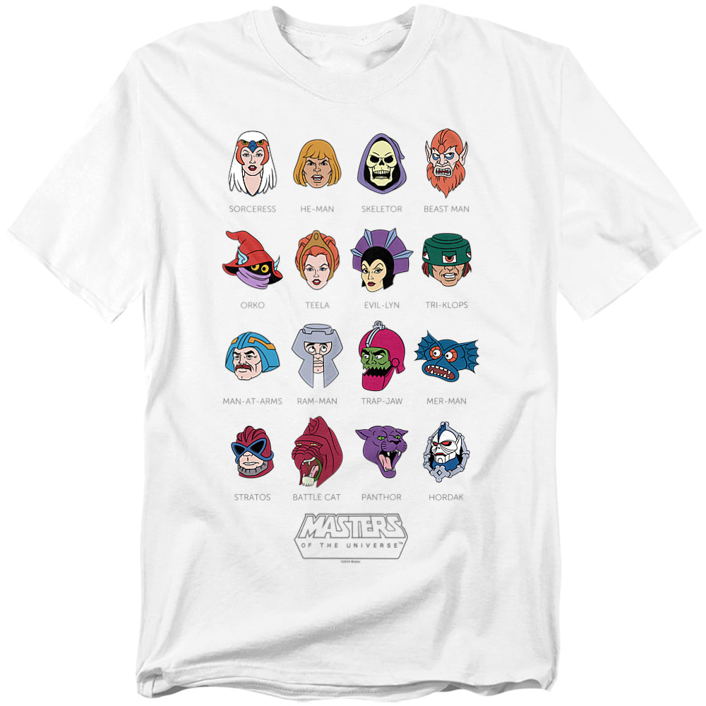 White Masters of the Universe t-shirt featuring 16 character headshots from the classic cartoon, including He-Man, Skeletor, Orko, Teela, Battle Cat, Evil-Lyn, and more, arranged in a grid with their names printed below each face.