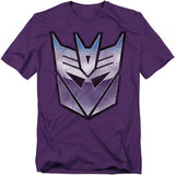Purple t-shirt featuring the metallic purple-and-silver Transformers Decepticon logo centered on the chest.