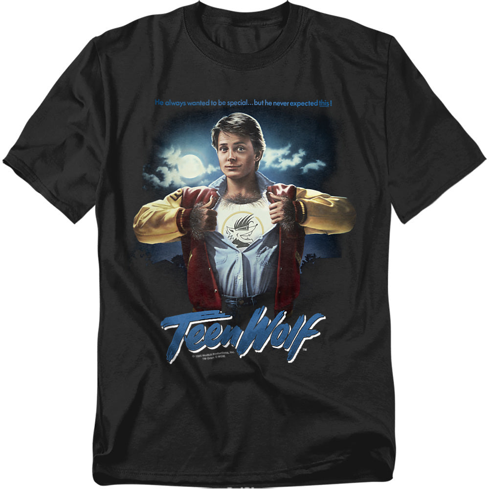 Black Teen Wolf t-shirt showing Michael J. Fox as Scott Howard pulling open his jacket and shirt to reveal a wolf logo on his chest, with a full moon and cloudy night sky in the background, and the Teen Wolf logo beneath.