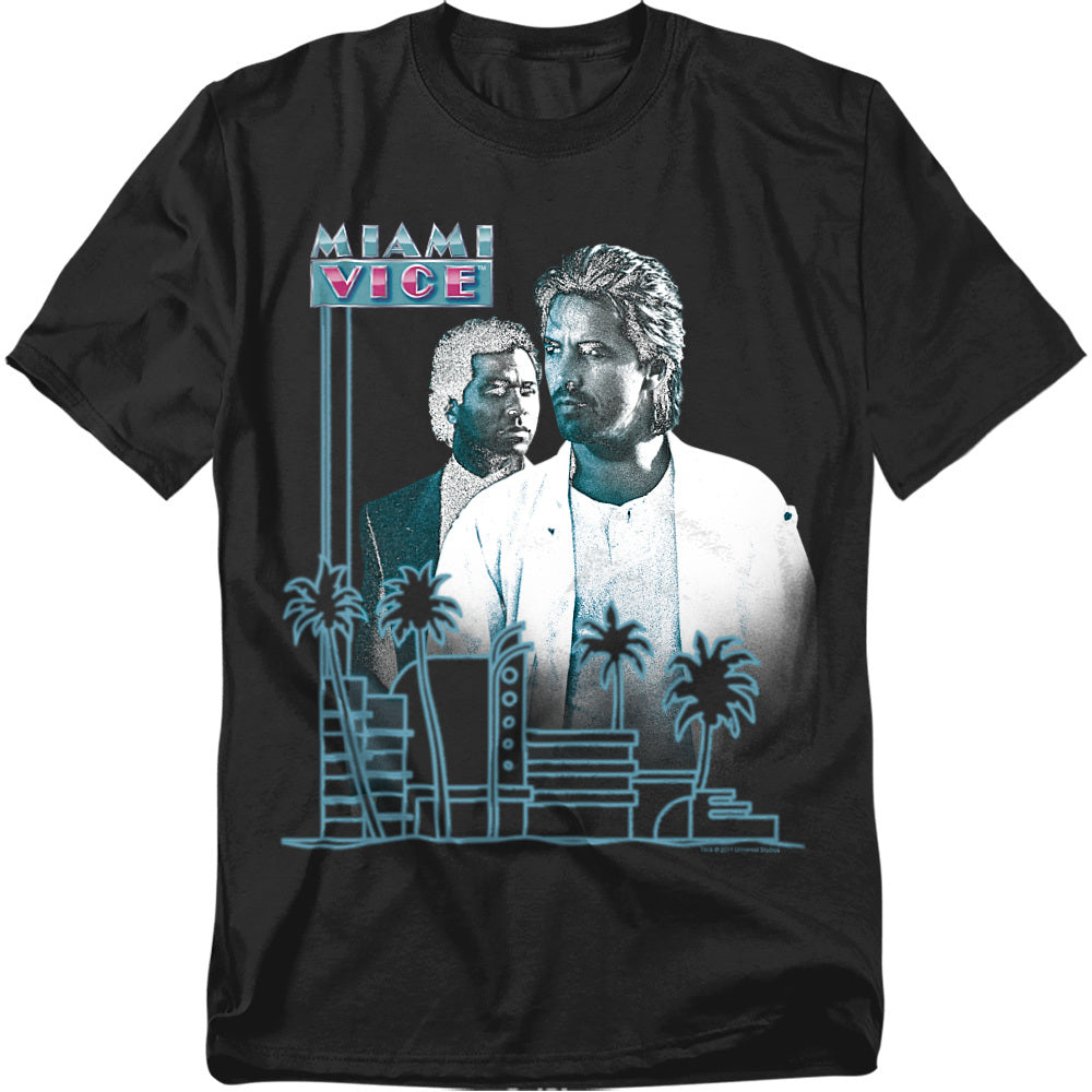 Black t-shirt featuring Crockett and Tubbs from Miami Vice with a neon pink and blue skyline, palm trees, and retro logo.