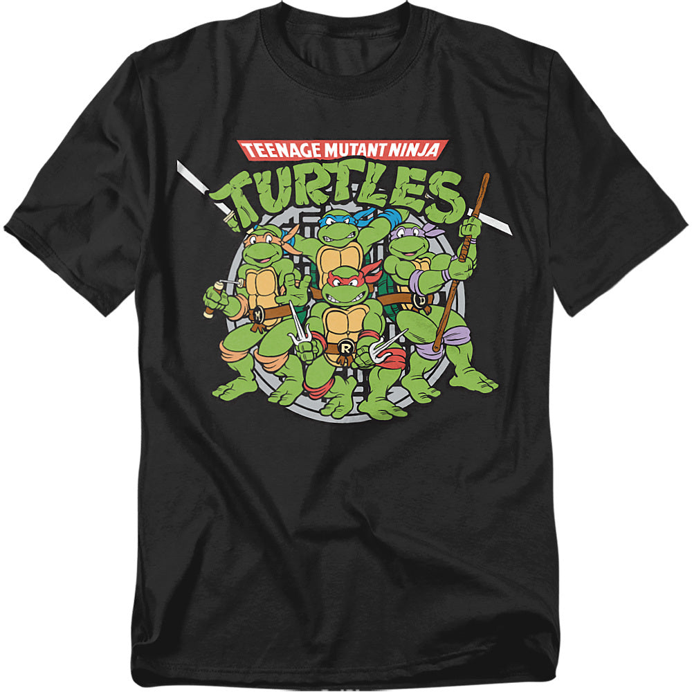 Black Teenage Mutant Ninja Turtles t-shirt featuring Leonardo, Donatello, Michelangelo, and Raphael standing together with weapons in front of a sewer cover design.