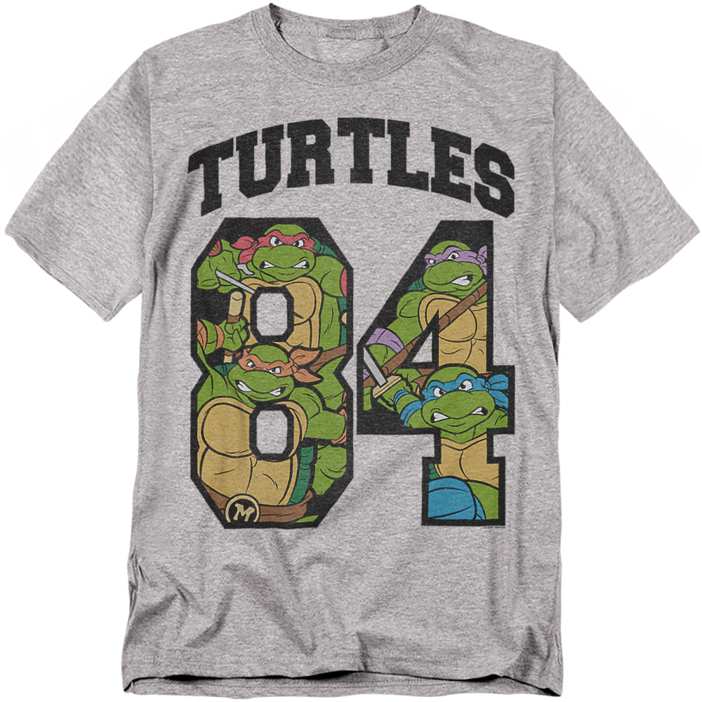 Teenage Mutant Ninja Turtles 1984 gray t-shirt featuring Leonardo, Donatello, Michelangelo, and Raphael inside varsity-style '84' numbers.