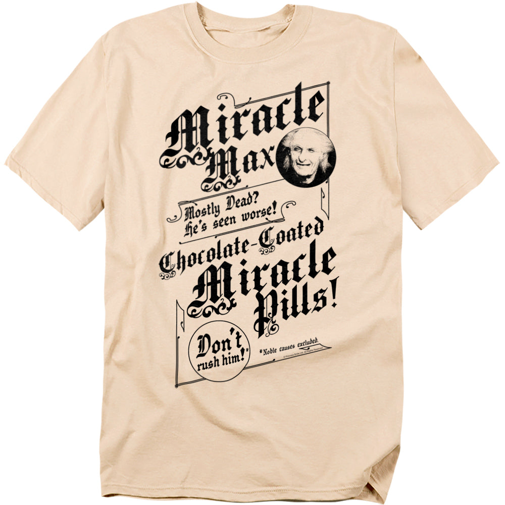 Beige t-shirt featuring a vintage-style advertisement design for Miracle Max’s Chocolate-Coated Miracle Pills from The Princess Bride, with quotes like “Mostly Dead? He’s seen worse!”