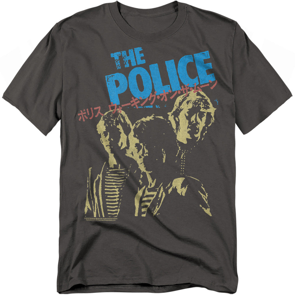 Dark gray t-shirt featuring a distressed yellow print of The Police band members with “The Police” in bold blue text above and red Japanese katakana spelling “Walking on the Moon.”