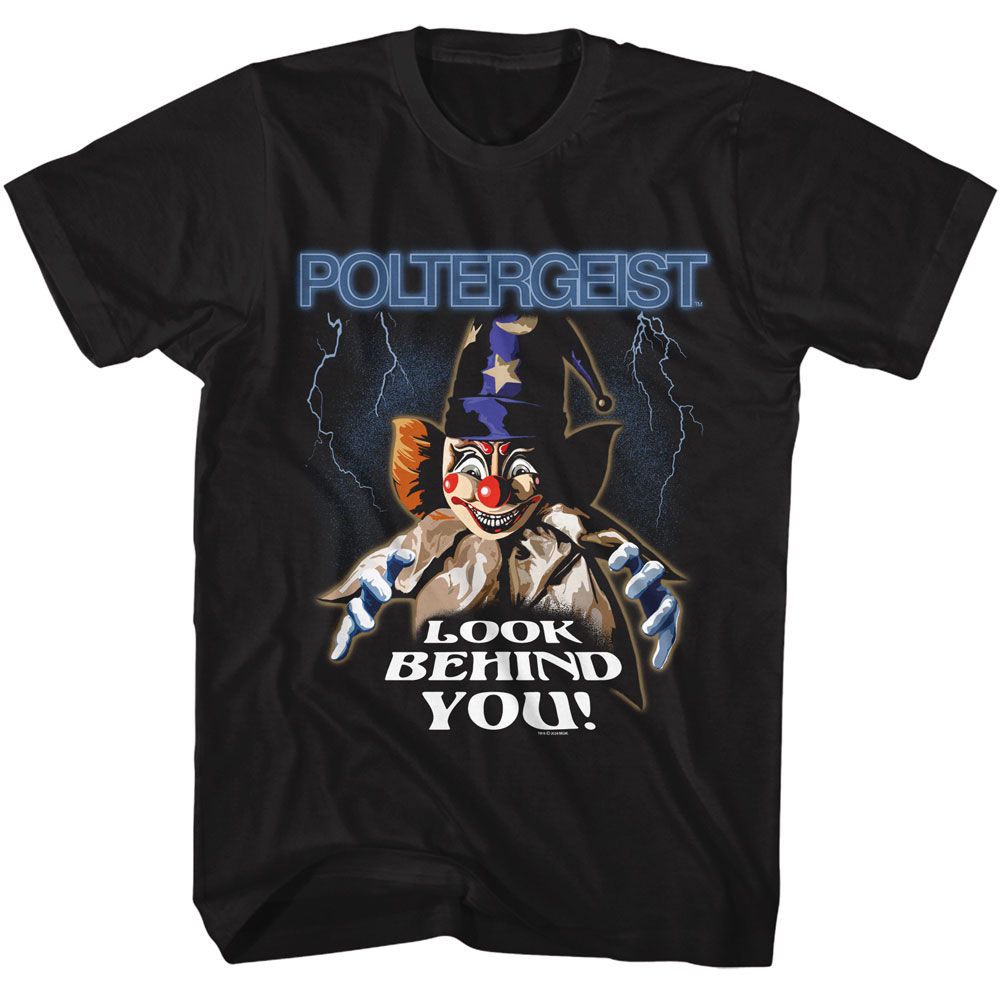 Black Poltergeist graphic T-shirt featuring creepy clown artwork with lightning effects and Look Behind You slogan