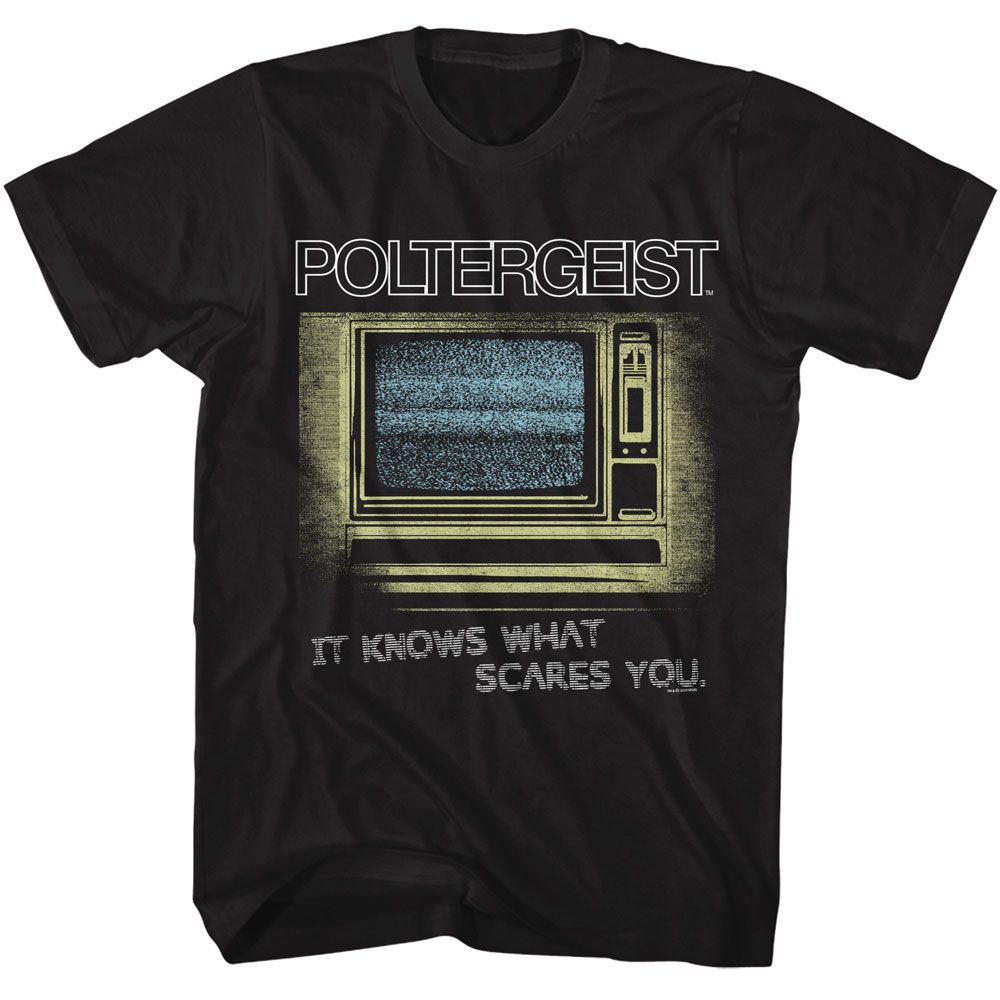Black Poltergeist graphic T-shirt featuring vintage television static artwork and It Knows What Scares You slogan
