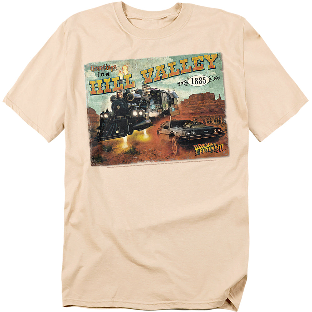 Beige t-shirt with 'Greetings from Hill Valley 1885' graphic featuring a train and car.