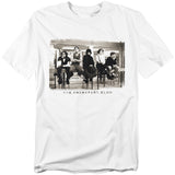 White t-shirt featuring a black-and-white image of The Breakfast Club cast sitting in the school library during detention, with the movie title below.