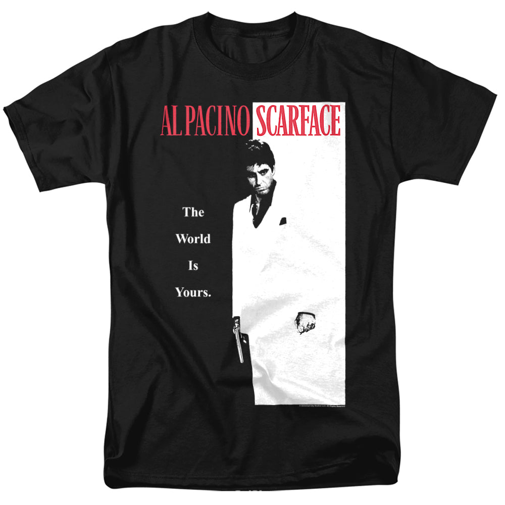 Black t-shirt with the classic Scarface movie poster design featuring Al Pacino as Tony Montana, with the text “The World Is Yours.”