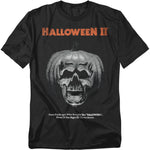 Black t-shirt with orange “Halloween II” text above a skull inside a carved pumpkin design, with tagline “More of the Night He Came Home.”