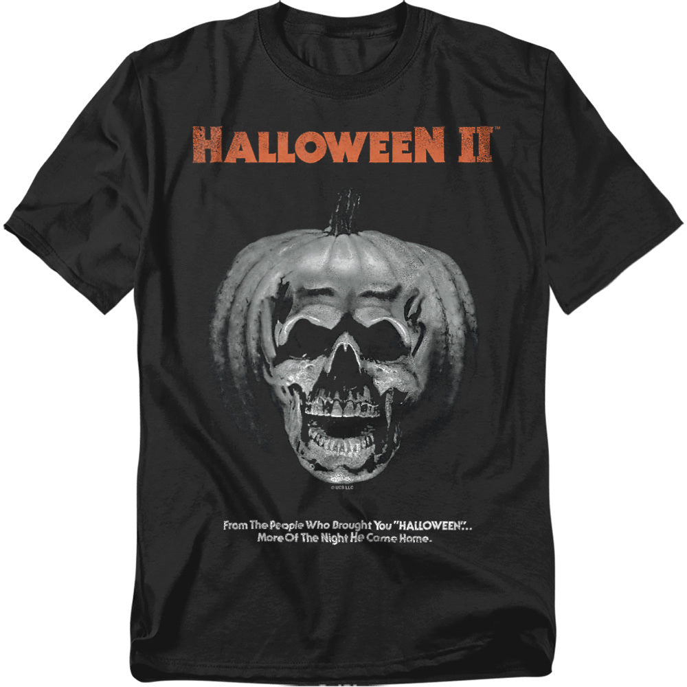 Black t-shirt with orange “Halloween II” text above a skull inside a carved pumpkin design, with tagline “More of the Night He Came Home.”