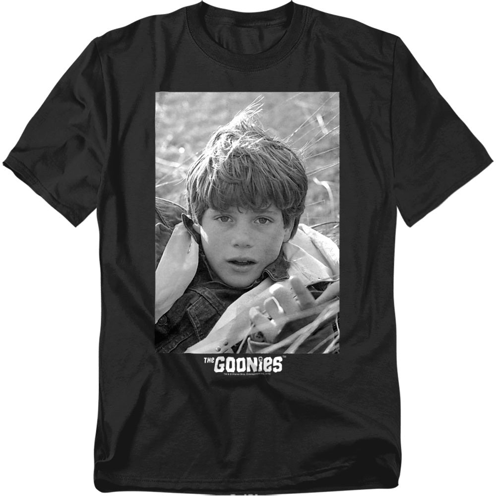 Black t-shirt with a graphic of a young boy and 'The Goonies' logo on a white background