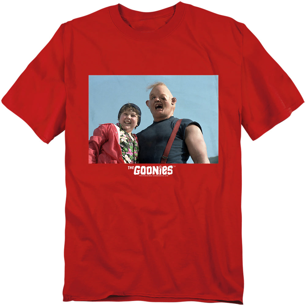 Red t-shirt with a graphic of two people and 'The Goonies' text on a white background