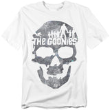 White t-shirt featuring a distressed skull graphic made from a treasure map with silhouettes of The Goonies characters and Sloth across the top.