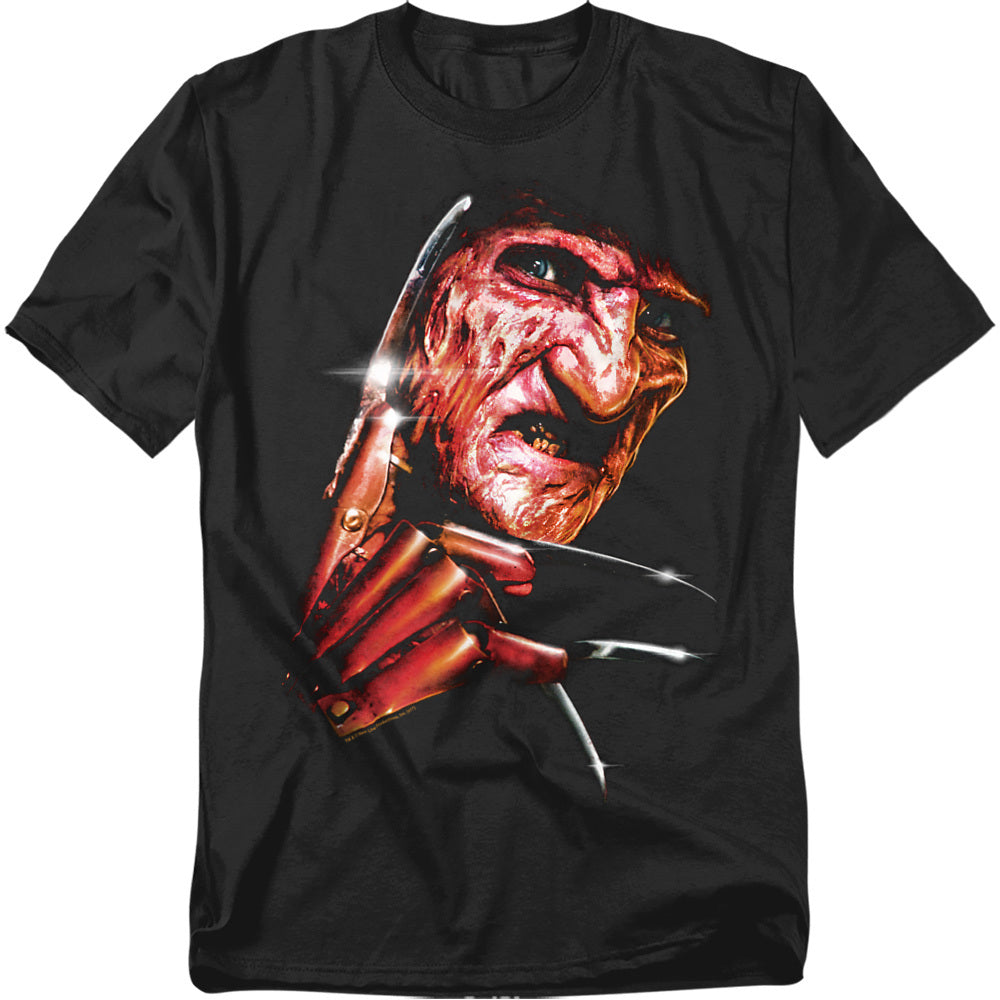Black t-shirt with a graphic of a character holding a knife on a white background
