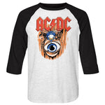 White and black raglan shirt featuring AC/DC’s logo with the cartoon “fly” character and eye graphic inspired by the Fly on the Wall album artwork.