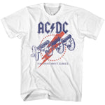 White AC/DC T-shirt featuring three vintage cannons, a red lightning bolt, and a circular ring of stars inspired by “For Those About to Rock.”
