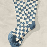 Blue and cream checkered crew socks featuring ribbed knit construction and vintage aesthetic