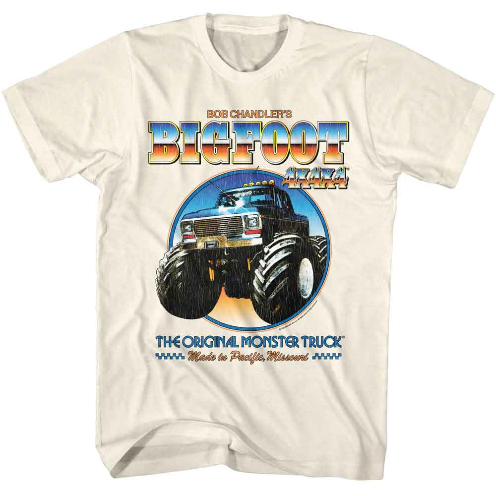 Cream Bigfoot 4x4x4 T-shirt featuring a front-facing Bigfoot monster truck inside a circular graphic with “Bob Chandler’s Bigfoot 4x4x4” text and “The Original Monster Truck” lettering below.