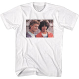 Bill and Ted standing together in a scene from Bill and Ted’s Excellent Adventure printed on a white T-shirt