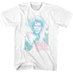 White T-shirt featuring a pastel blue and pink pop art-style portrait of Billy Idol with his name printed below.