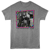 Heather grey T-shirt featuring a black-and-white image of The Breakfast Club cast inside a pink, teal, and yellow 80s-style geometric frame with “The Breakfast Club” text below.