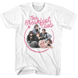 White T-shirt featuring the main cast of The Breakfast Club inside a pink circle outline with a retro pink script logo reading “The Breakfast Club.”
