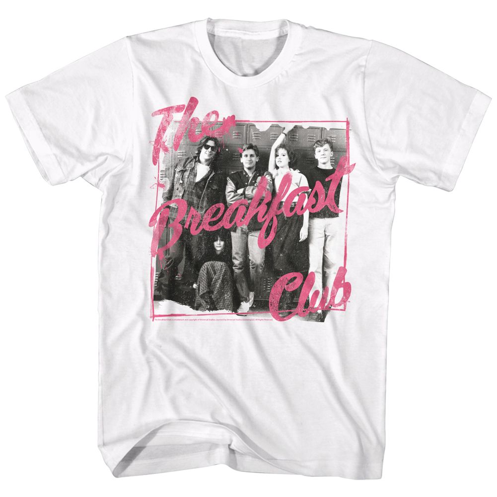 White T-shirt featuring a black-and-white cast photo from The Breakfast Club in front of lockers, overlaid with bright pink handwritten-style script reading “The Breakfast Club.”