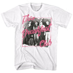 White T-shirt featuring a black-and-white cast photo from The Breakfast Club in front of lockers, overlaid with bright pink handwritten-style script reading “The Breakfast Club.”