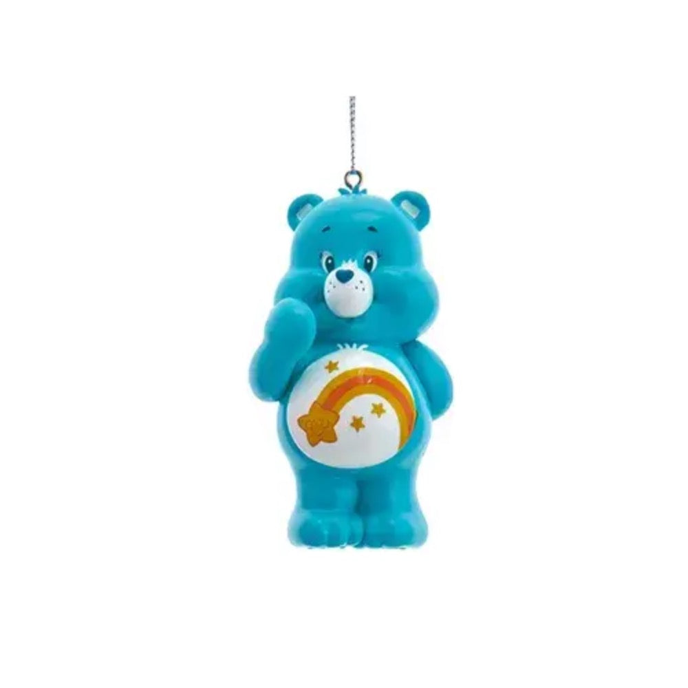 Wish Care Bear ornament with shooting star and rainbow belly badge hanging from a silver string.