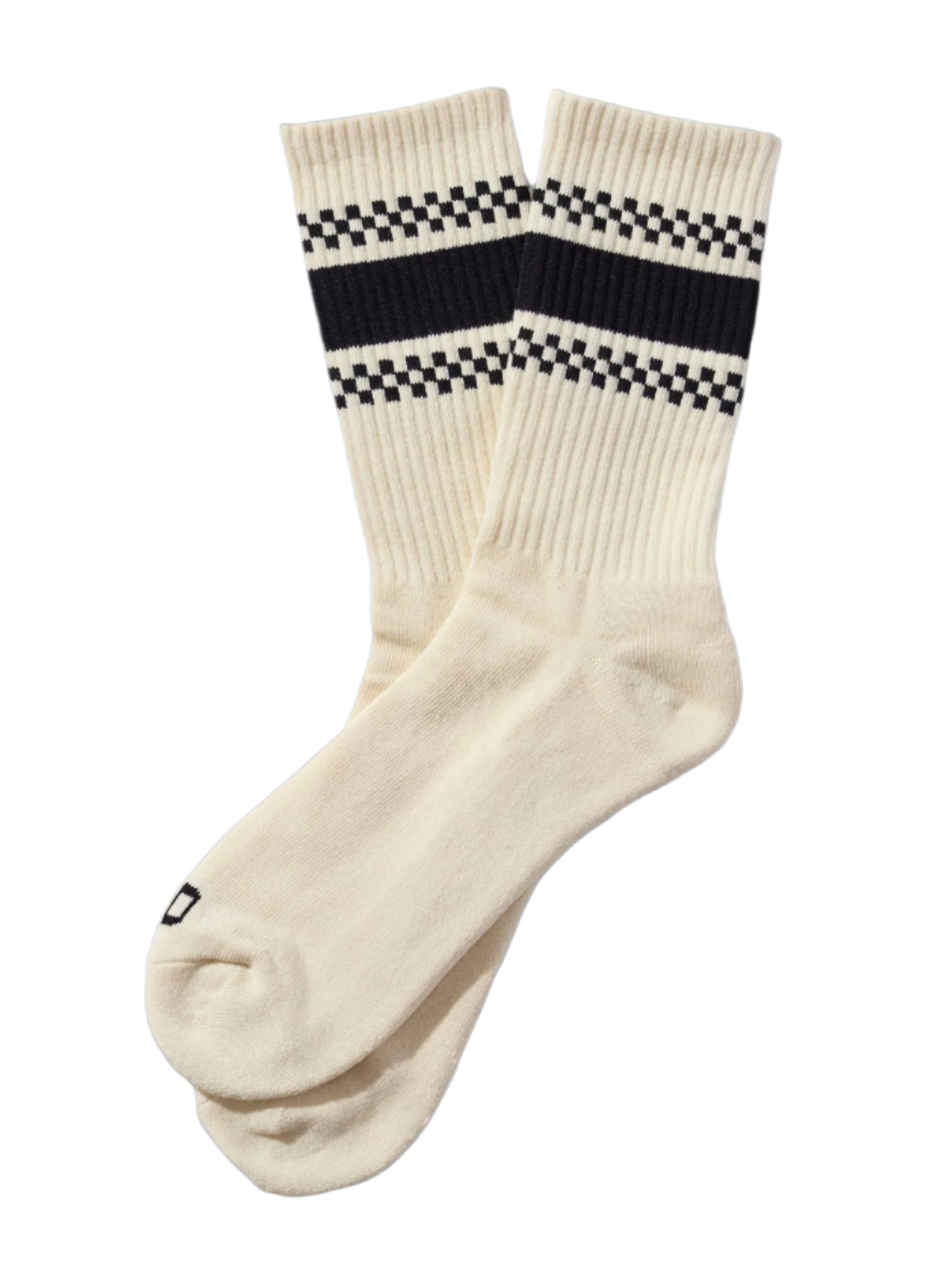 White socks with black and white checkered bands on a beige background