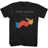 Black Foreigner T-shirt featuring the band name across the top with “Agent Provocateur” underneath and a distressed geometric arrow-style design in blue, red, and yellow.