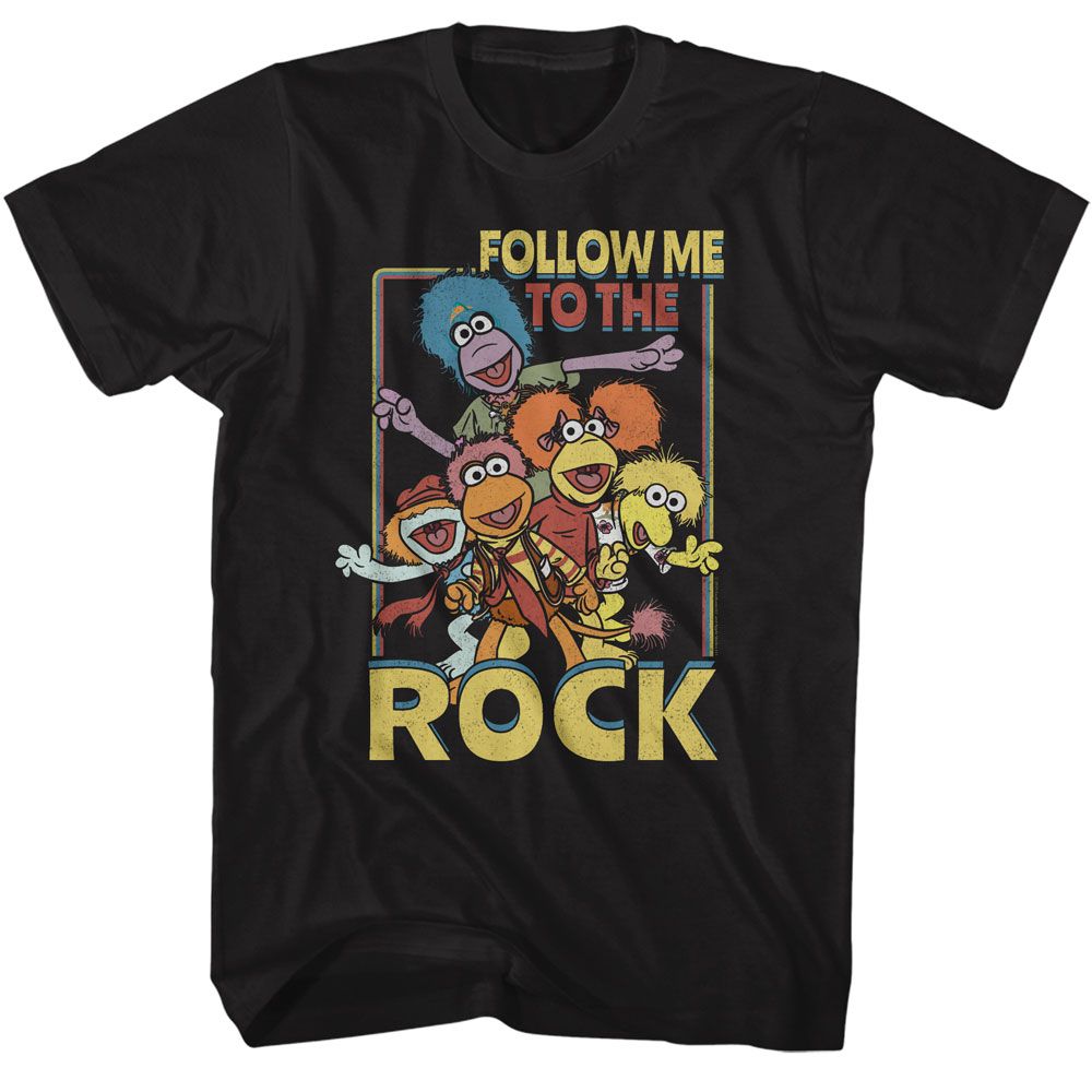 Black T-shirt featuring colorful Fraggle Rock characters with the text “Follow Me to the Rock.”