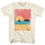 Cream-colored Jaws T-Shirt featuring a minimalist retro travel poster design with Amity Island beach, shark fin, and sunset artwork