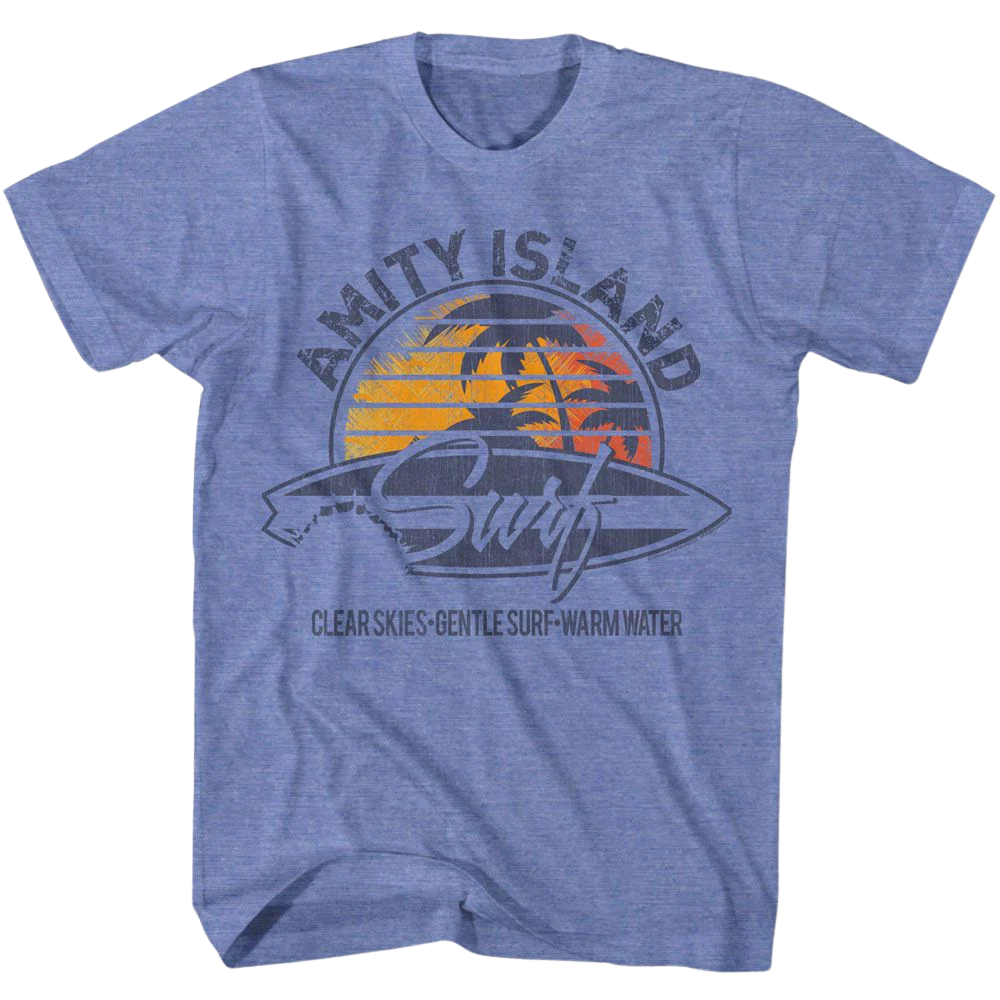 Heather blue Jaws Amity Island surf T-shirt featuring sunset palm graphic and shark-bitten surfboard