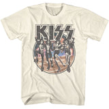 Cream-colored KISS T-shirt featuring comic-style illustrations of the band members in full makeup with a cosmic desert background.