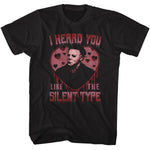 Black horror t-shirt featuring Michael Myers inside a distressed red heart with dripping text reading “I Heard You Like the Silent Type.”