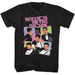 Black T-shirt featuring New Kids on the Block in tuxedos arranged in colorful pop-art style blocks with retro doodle accents and a pink NKOTB logo above.