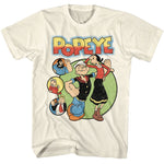 Cream-colored T-shirt featuring Popeye, Olive Oyl, and classic cartoon characters in a vintage comic-style design with the colorful “Popeye” logo above.