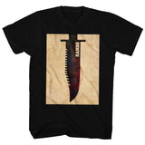 Vintage Rambo T-shirt featuring minimalist design of Rambo’s iconic survival knife with distressed beige background, inspired by the 1980s action movie First Blood.