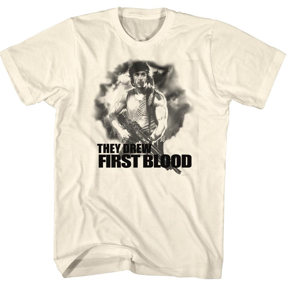 Vintage cream Rambo T-shirt featuring Sylvester Stallone as John Rambo with the quote “They Drew First Blood” from the 1982 action classic.