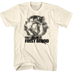 Vintage cream Rambo T-shirt featuring Sylvester Stallone as John Rambo with the quote “They Drew First Blood” from the 1982 action classic.